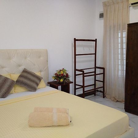 Living Home Negombo Kamer foto
