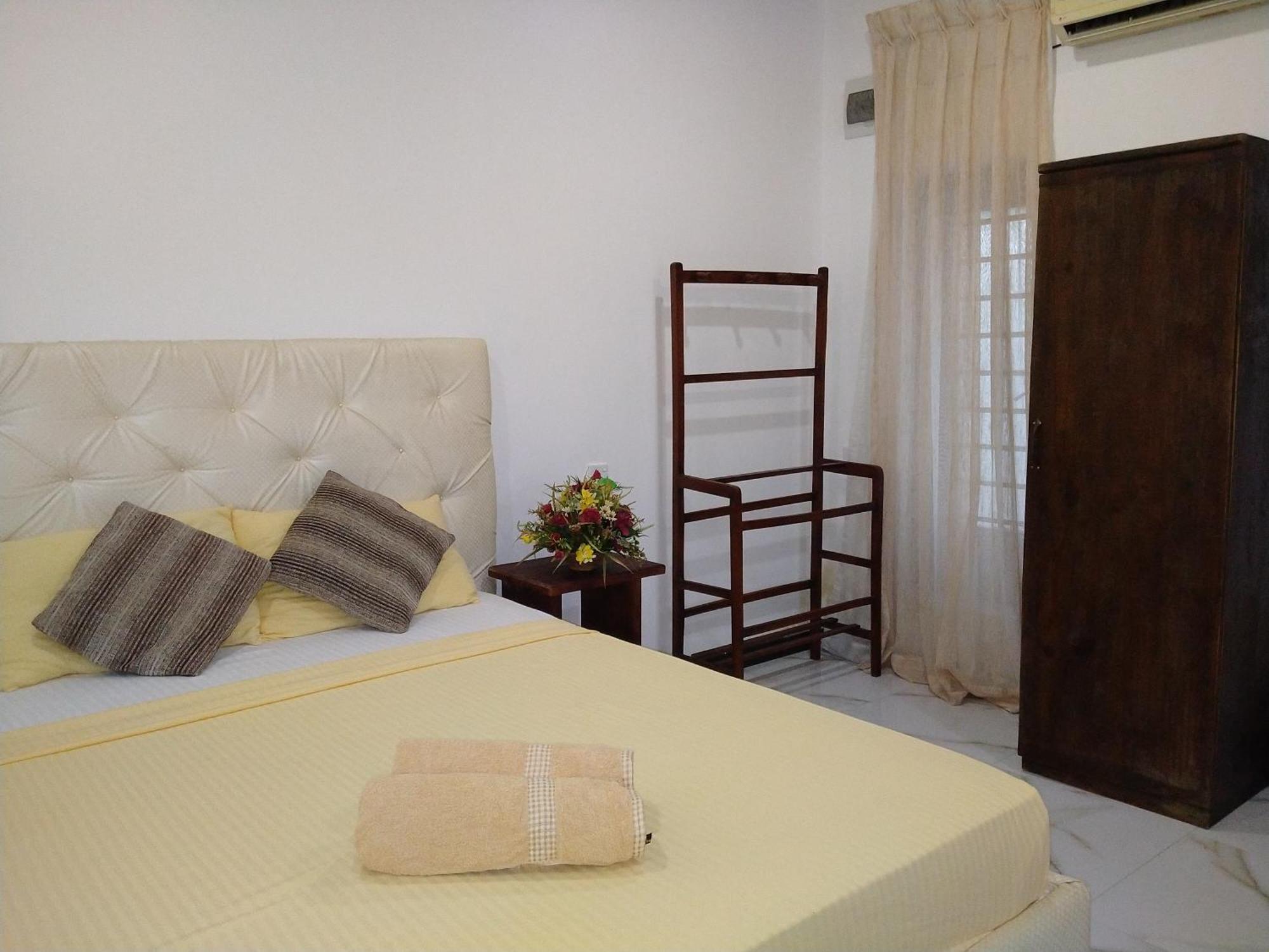 Living Home Negombo Kamer foto