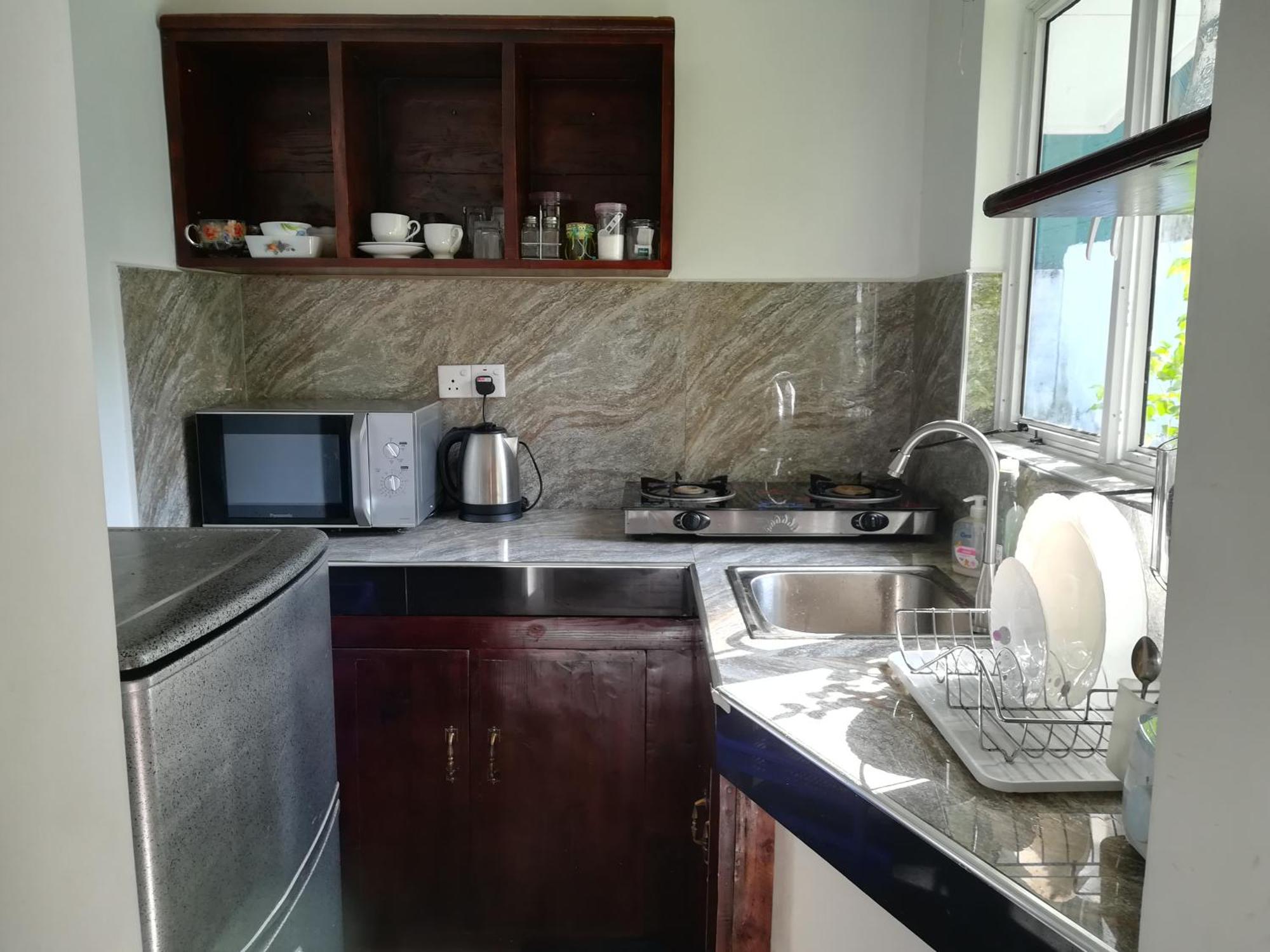 Living Home Negombo Kamer foto
