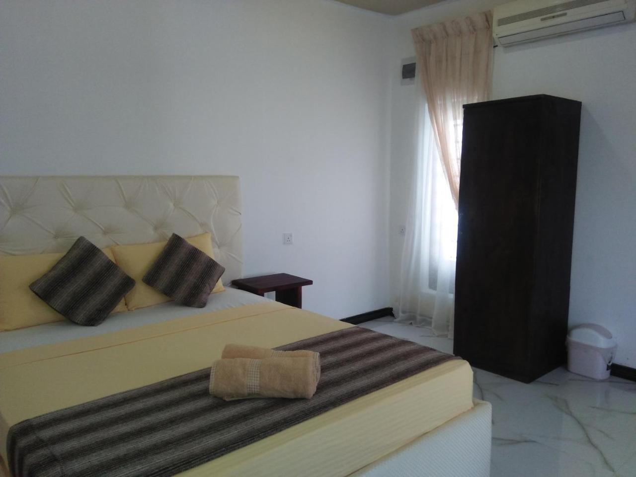Living Home Negombo Kamer foto